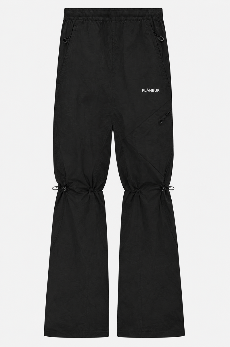 Turtle Nylon Trousers Black – knee cords pulled for a flared fit